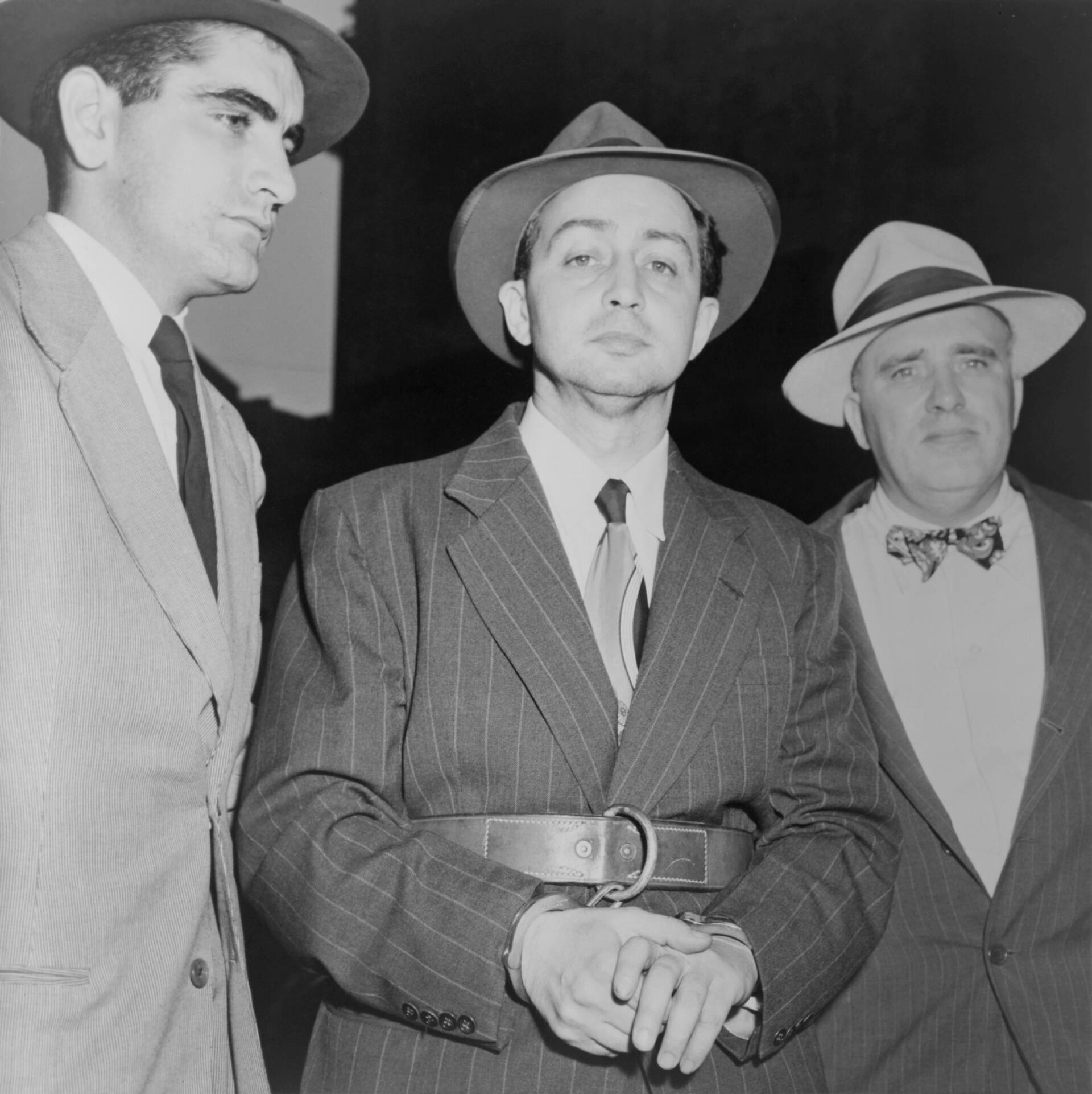 Harry Gold pidätettynä vuonna 1950. Hänen todistustaan on myöhemmin pidetty hyvin epäluotettavana. 