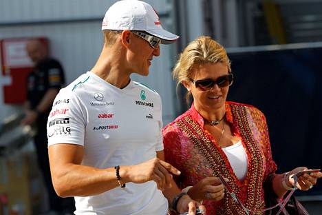 Michael ja Corinna Schumacher Unkarin osakilpailussa vuonna 2012.