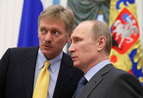 Peskov ja Putin Moskovassa vuonna 2014.