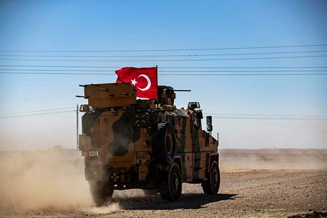 Turkkilainen sotilasajoneuvo kuvattiin Syyriassa Tal Abyadin kaupungin lähellä syyskuussa.