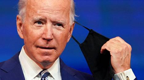 Joe Biden riisui maskinsa puheenvuoroa varten 9. joulukuuta.