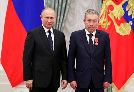 Venäjän presidentti Vladimir Putin ja Lukoilin hallituksen puheenjohtaja Ravil Maganov