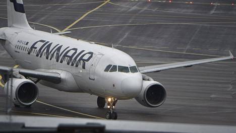 Finnairin matkustajakone kuvituskuvassa.