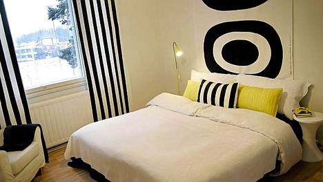 Helsingin Kulosaaressa sijaitsevan kaksion lastenhuoneesta loihdittiin tyylikäs makuuhuone.