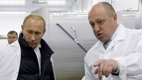 Jevgeni Prigozhin (kuvassa oikealla) on Vladimir Putinin läheinen liittolainen.