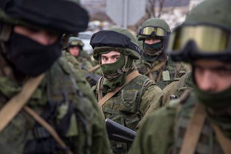 ”Vihreät miehet”, tunnuksettomat venäläissotilaat, miehittivät Krimin maaliskuussa 2014 ja käynnistivät niemimaan anastuksen Ukrainalta.
