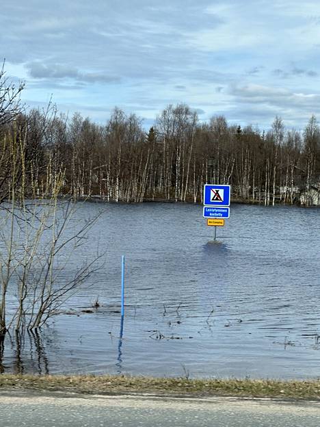 Camping is prohibited, say signs in the flooded area at Muonio.