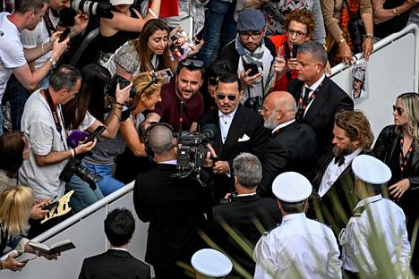 Media and fans flocked to Depp.