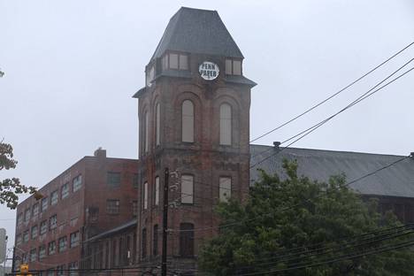 The Pen Paper Tower building is the first image that appears in the opening credits of the series.  It was filmed by John Krasinski, who plays Jim Halpert, on his first visit to Scranton.
