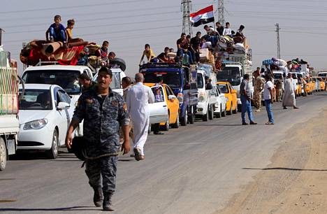 Kurdiperheitä kuvattiin palaamassa koteihinsa Hawijan alueella, joka oli aiemmin Isisin hallussa.