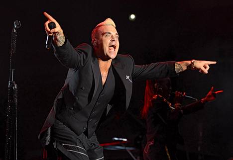 Megatähti Robbie Williams menetti tyttöystävänsä Suomessa – päätyi sänkyyn  keravalaisen kanssa: ”En ollut kovin rehellinen” - Musiikki - Ilta-Sanomat