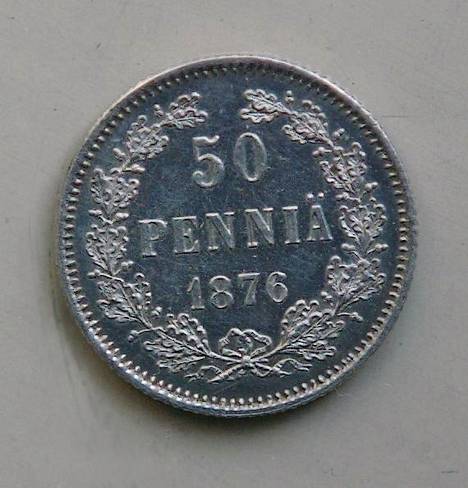 50 pennin hopeakolikko vuodelta 1876 on niin sanottua ”keisarin heittorahaa”.