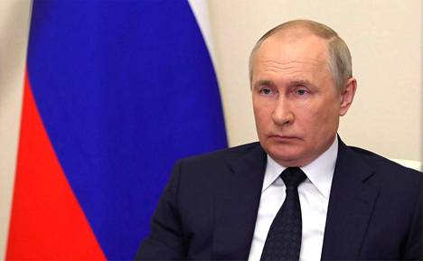 Vladimir Putin kuvattuna osallistumassa Venäjän hallituksen videotapaamiseen 23. maaliskuuta.