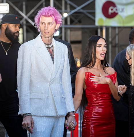 Megan Fox has had a relationship with rap artist Machine Gun Kelly (left), which has been fueled by cheating rumours.