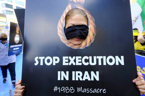 Lopettakaa teloitukset Iranissa, vaativat mielenosoittajat kesäkuussa Brysselissä.