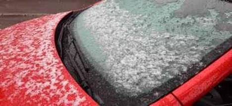 Snow on top of Mirka Airesvuo's car. 