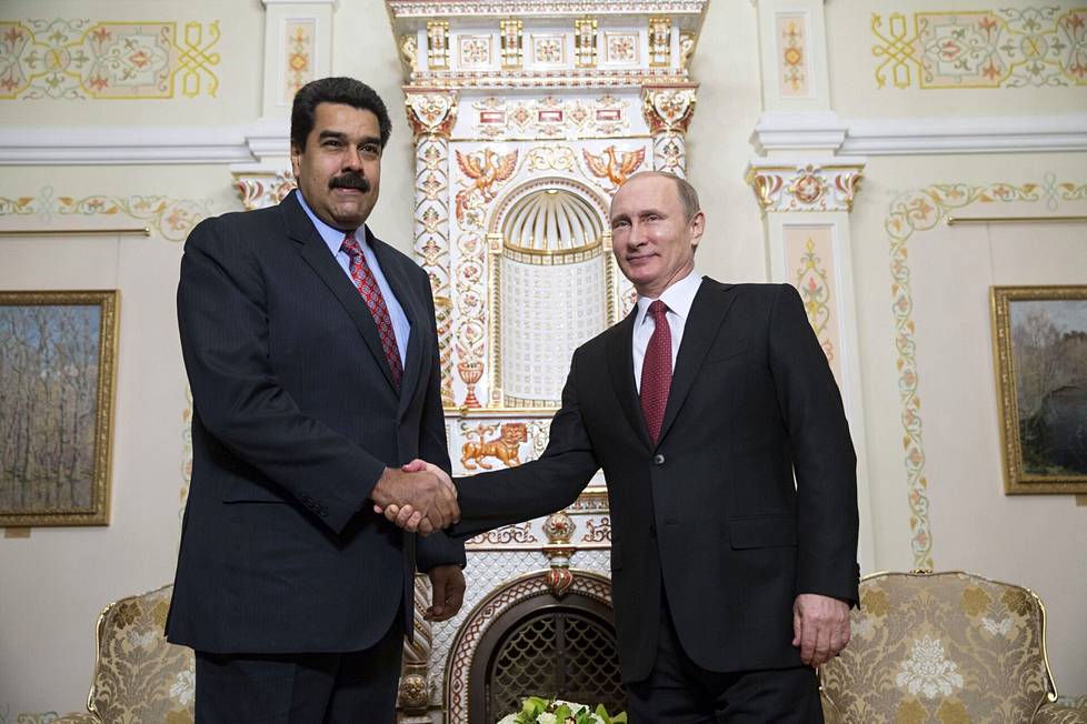 Vladimir Putin (oik.) ja Venezuelan presidentti Nicolas Maduro ovat jo pitkään olleet hyvää pataa.