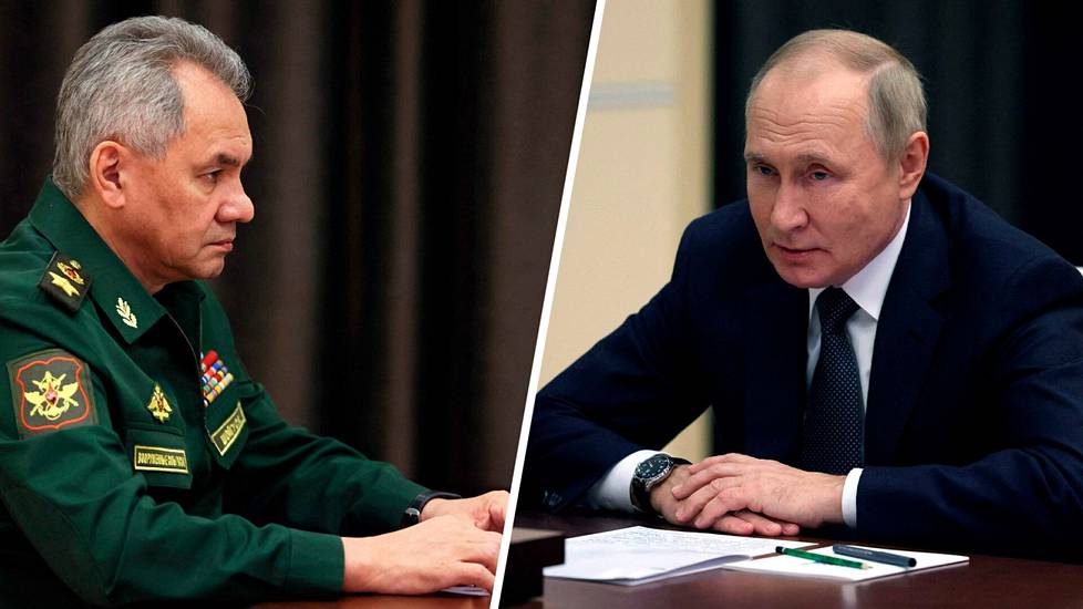 Venäjän puolustusministeri Sergei Shoigu (vas) kertoo liikekannallepanon tulleen päätökseen. Presidentti Vladimir Putinin suusta ei lopetusta ole virallisesti kuultu.