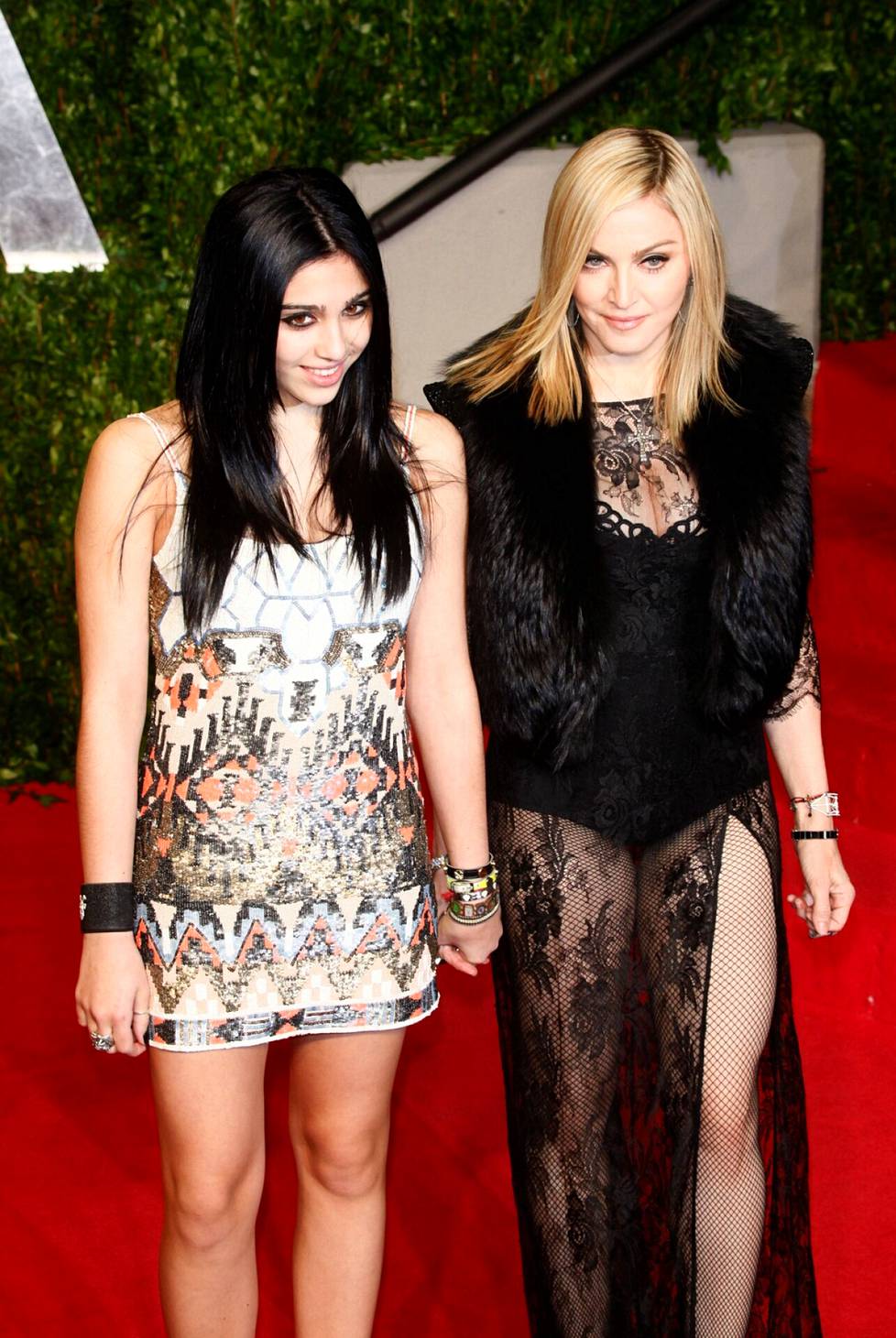 Madonnan tytär Lourdes Leon äitinsä kanssa vuonna 2011. 